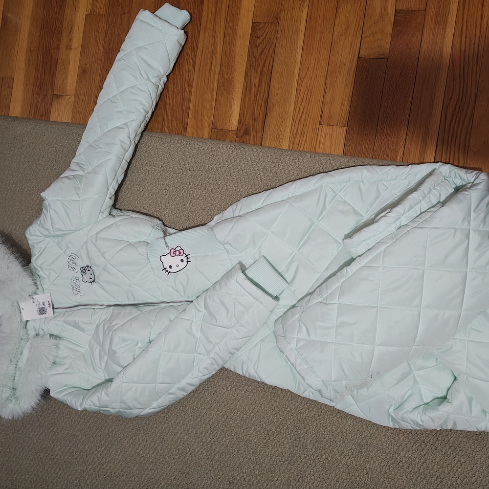 Light Blue Quilted Jacket with Fur Trim